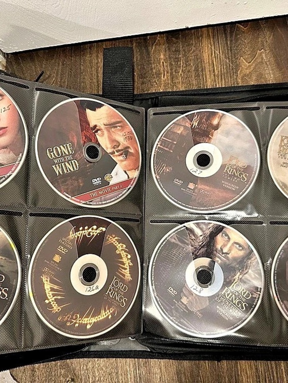 Binder Lot of 209 DVDs